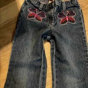 Blue and Pink Jeans with Butterfly Embellishments